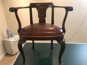 Value and Information on Antique Chairs - front view of low back chair with offset legs