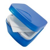 Small blue container of cleaning wipes