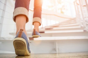 Woman walking up stairs