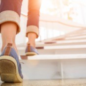 Woman walking up stairs