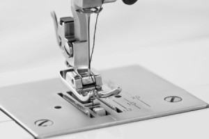 Close-up of sewing machine needle