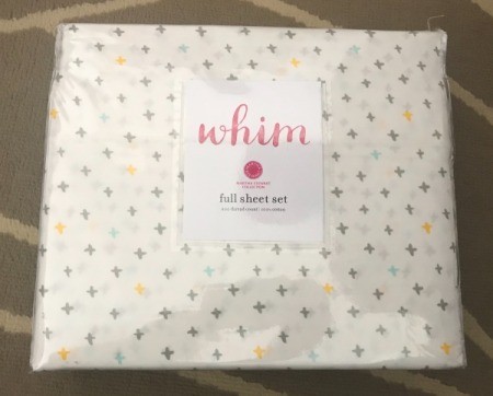 Bedsheets that have been put back into their original packaging.