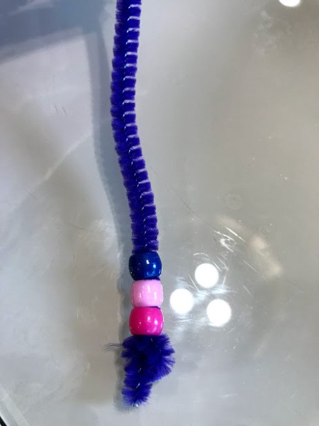 Pipe Cleaner Snake Toddler Craft - three beads on pipe cleaner