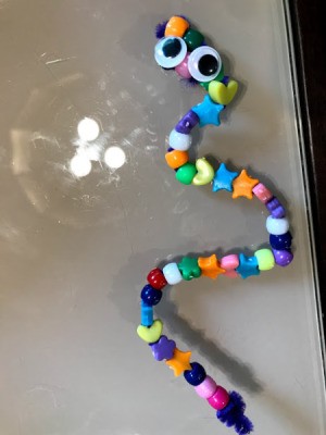 Pipe Cleaner Snake Toddler Craft - finished snake with google eyes