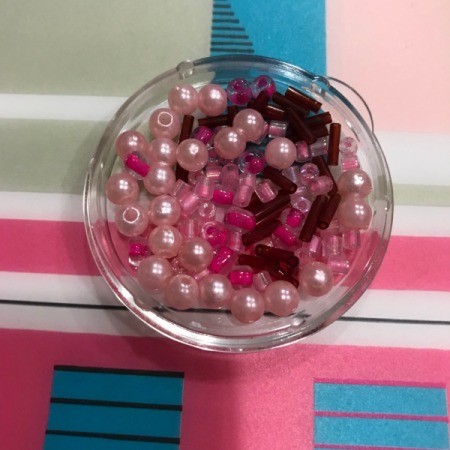 Clear Plastic Cap Magnets - closeup of beads inside the cap