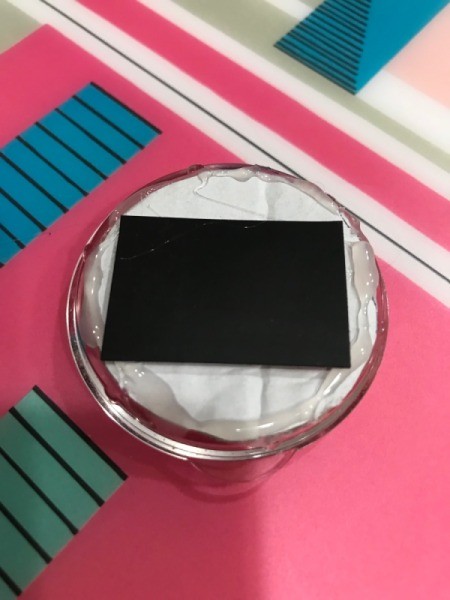 Clear Plastic Cap Magnets - add a circle of glue around the outside of the cardboard to seal and attach magnet