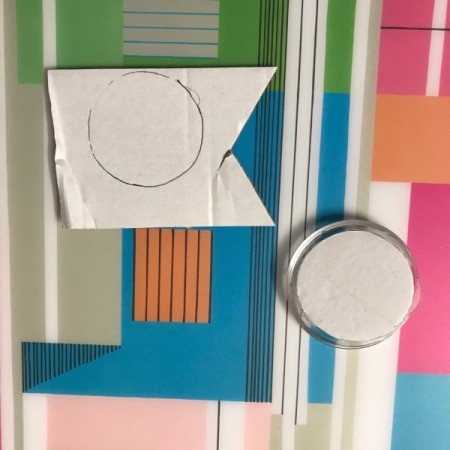 Clear Plastic Cap Magnets - circle on cardboard and on piece on cap