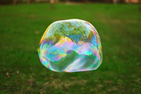 Large Bubble outside with grass background