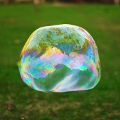 Large Bubble outside with grass background
