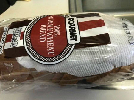A paper towel inside a package of sliced bread for the freezer.