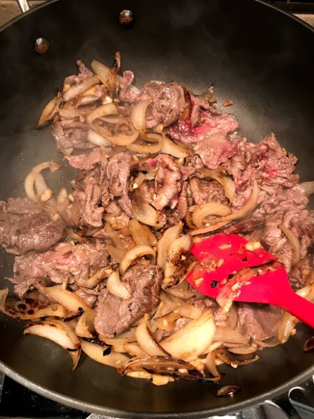 beef and noodles in pan