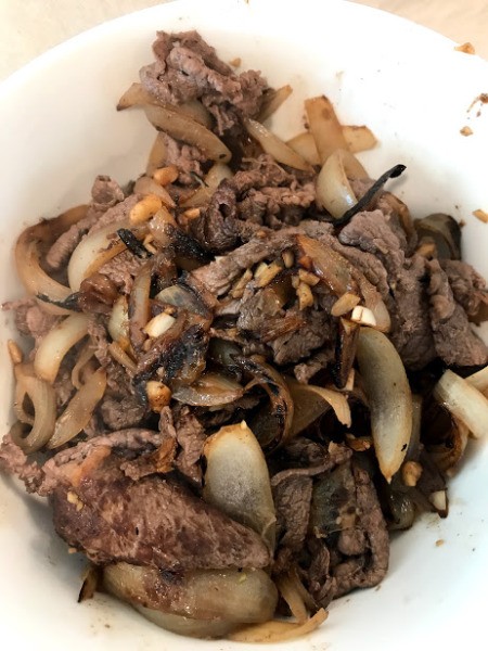 cooked beef in bowl