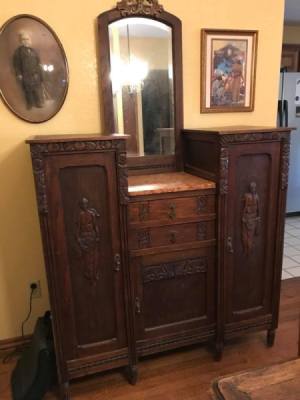 Identifying an Antique Dresser - mirrored dresser with two side cabinets, two center drawers, and a doored area below the drawers