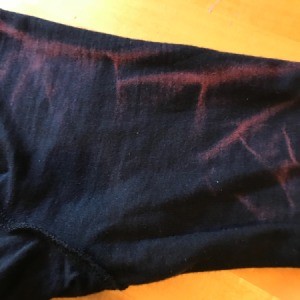 Removing Dye that Transferred in the Wash - red streaks on dark shirt