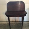 Value of Mersman Card Table - view of dark wood card table with one side folded up