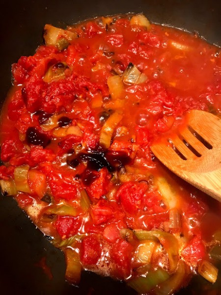 tomatoes to Bok Choy in pan
