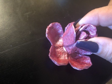 Egg Carton Rose Brooch - affix the center and glue the next petals up slightly staggering the petals