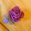 Egg Carton Rose Brooch - brooch on the front of a yellow cardigan