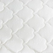 Close up of a mattress.