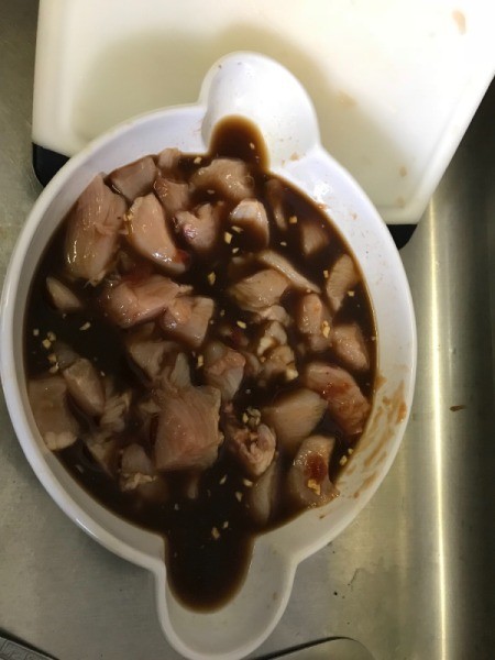 Chicken added to sauce bowl