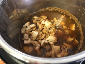 cooked Orange Chicken in pot