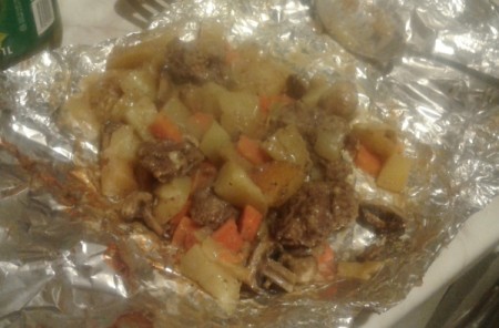 cooked Meat and Veggie Dinner on foil