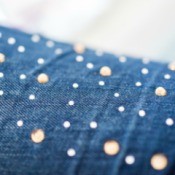 Close up of rhinestone embellished jeans.