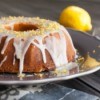 Bundt cake glazed and topped with lemon zest.