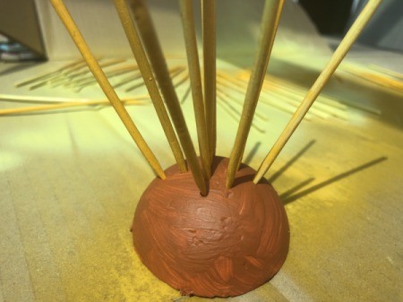 Skewer Starburst Decor - begin at the center and begin poking the skewers into the ball, those with a pointed tip can be used to make a hole for the ones with a flat tip