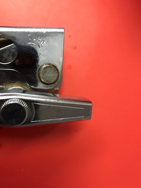 A can opener that has been cleaned from rust.