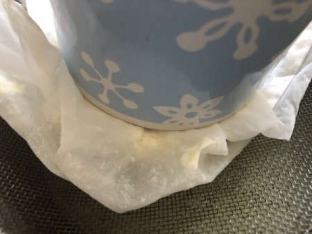 bowl added to weight straining curds