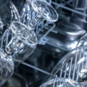 Shiny dishwasher with clean wine glasses
