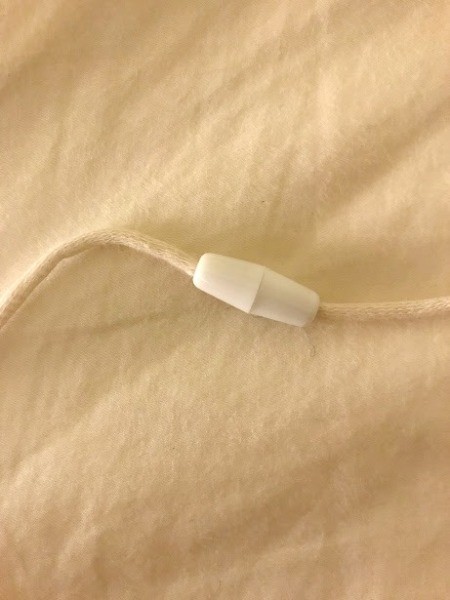 Toddler Felt Ball Necklace - slip on other half of the clasp and knot the yarn end