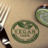 100% Vegan stamp next to knife and fork