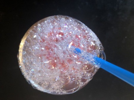 Bubble Art - blow bubbles with the straw so that they come up above the top of the cup