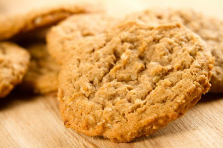 Close-up of oatmeal cookies on a wooden cutting board