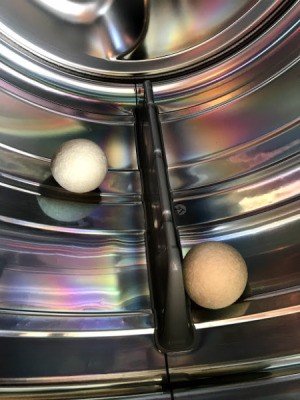 Wool Balls as Natural Fabric Softener - two wool balls in the dryer