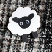 Cardstock Sheep Badge - brooch on black and white garment