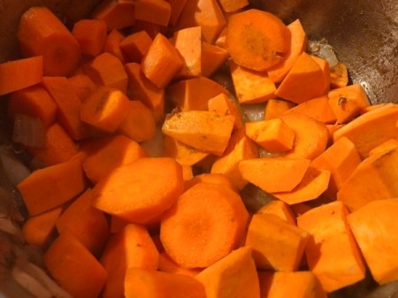 sweet potatoes and carrots added to pan