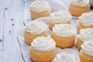 Frosted white cupcakes.