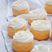 Frosted white cupcakes.