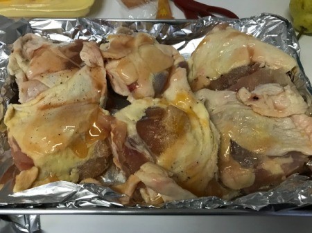 chicken with duck sauce on foil lined pan