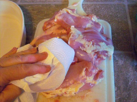 washing and drying chicken