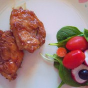 Honey Garlic Chicken on plate with salad