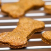 Dog biscuits on a cooling rack.
