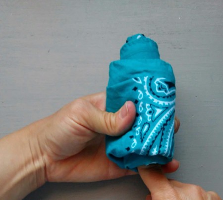 Bandana Butterfly - push up center while holding roll tightly