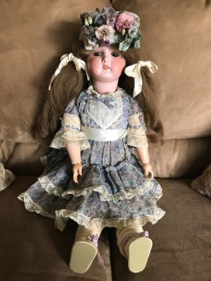 Identifying a Porcelain Doll - doll in print dress with lace