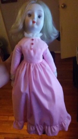 Identifying a Porcelain Doll - doll in a pink dress