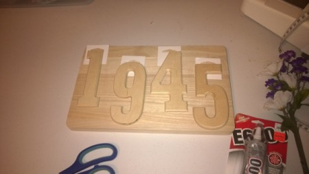House Address Sign Using Glass Nuggets - arrange numbers on board and glue down