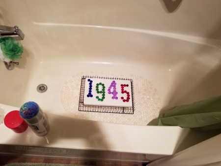 House Address Sign Using Glass Nuggets - placed in tub and weighted down to help nuggets stick firmly